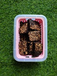 Directly above shot of food on table against green background