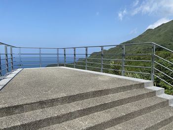 Staircase against blue sky