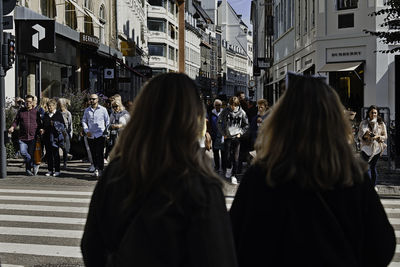 People walking on city street