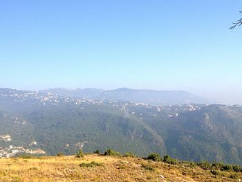 Scenic view of mountains against clear sky