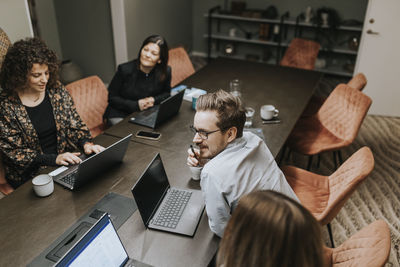 View of people at business meeting