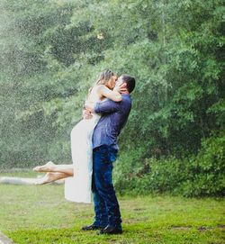 Full length of couple standing on land