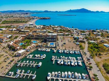 High angle view of city, boat , beach, sea