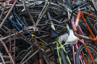 High angle view of abandoned bicycle on field
