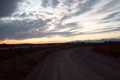 Scenic view of landscape against sky during sunset