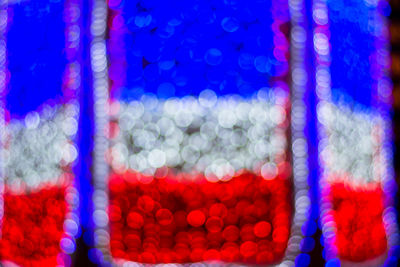 Defocused image of illuminated christmas lights