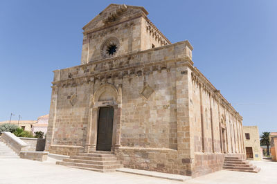 Low angle view of old building against clear sky