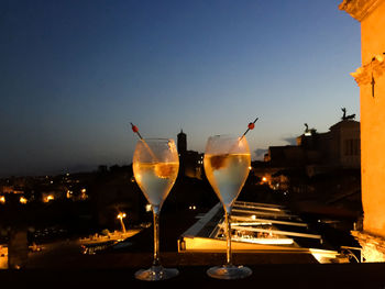 Close-up of drink at sunset