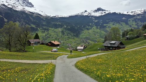 Scenic view of landscape and mountains against sky