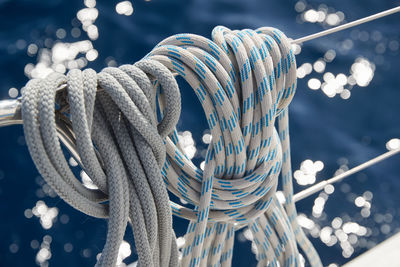 Close-up of rope tied to metal