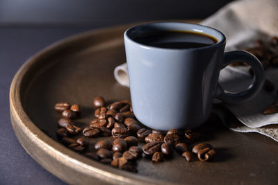 Close-up of coffee cup on table