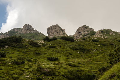 Scenic view of rocky mountains against sky