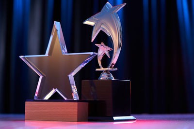 Close-up of illuminated lighting equipment on table