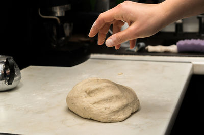 Close-up of person preparing food