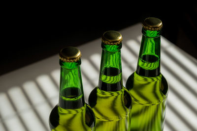 High angle view of wine bottles on table