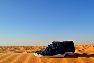 View of desert against clear sky