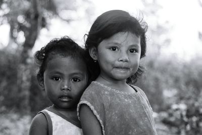 Portrait of cute siblings