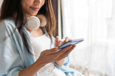 Young woman using mobile phone