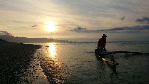 Scenic view of sea at sunset