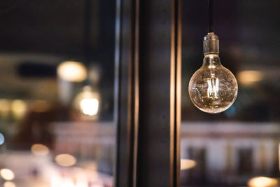 Close-up of illuminated light bulb