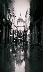 View of illuminated buildings in city