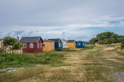 House on field against sky