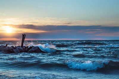 Scenic view of sea against sky during sunset