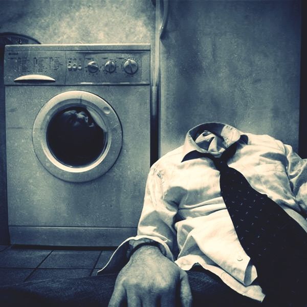 one person, human leg, real people, human body part, low section, washing machine, men, shoe, indoors, one man only, sitting, close-up, day, human hand, laundromat, only men, adult, people