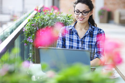 Young woman using mobile phone