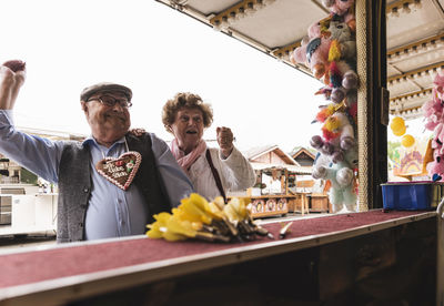 Senior couple having fun on fair