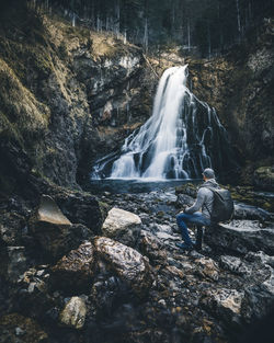 Scenic view of waterfall in forest