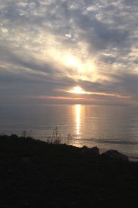 Scenic view of sea at sunset