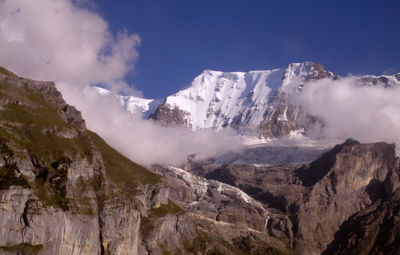 Scenic view of mountains against sky during winter