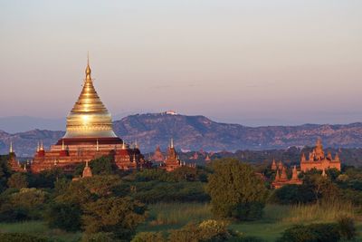 Scenic view of temples against sky