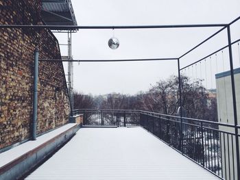 Footbridge with trees in background