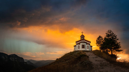 Scenic view of mountains against sky during sunset