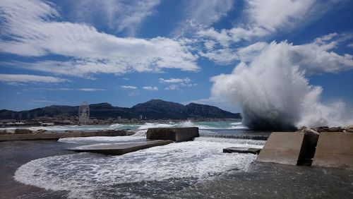 Panoramic view of sea against cloudy sky