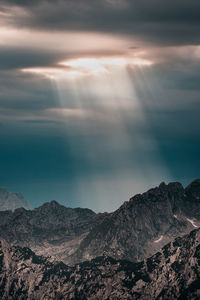 Scenic view of mountains against sky during sunset