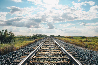 Railroad tracks against sky