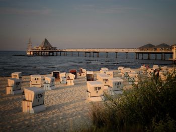 View of built structure by sea