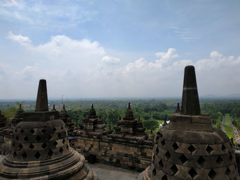 Stupas of building against sky