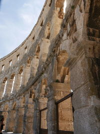 Low angle view of old building against sky