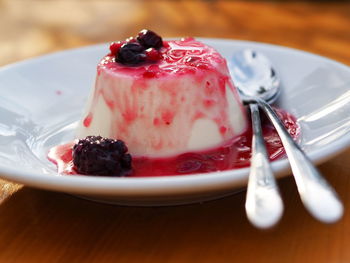 Close-up of cake slice in plate on table