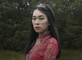 Portrait of young woman looking away