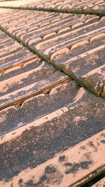 High angle view of rusty metal on field