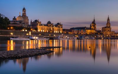 Reflection of illuminated buildings in water