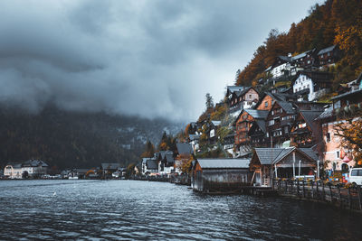 Moody fall scenery of hallstatt at dawn, a peaceful lakeside village