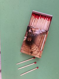 High angle view of paintbrushes on table