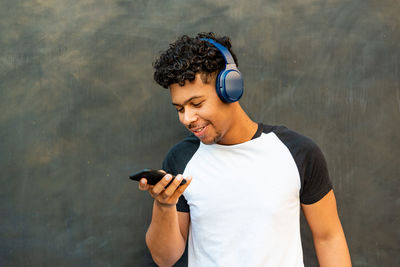 Young man using mobile phone