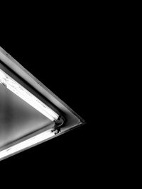 Low angle view of illuminated lamp